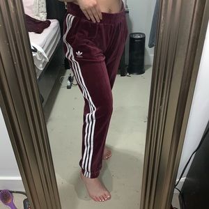 Burgundy Adidas velour track pants
